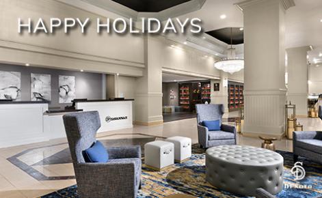 eGift Card image of the internal shot of the lobby with the text “Happy Holidays” and The DeSoto logo