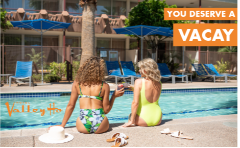 women lounging at OHasis Pool; text says "You Deserve a Vacay"