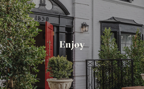 Gift card image of the exterior entrance of the hotel with the text “Enjoy”