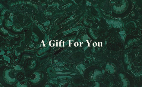 Gift card image with the text “A Gift For You” on the hotel wallpaper background